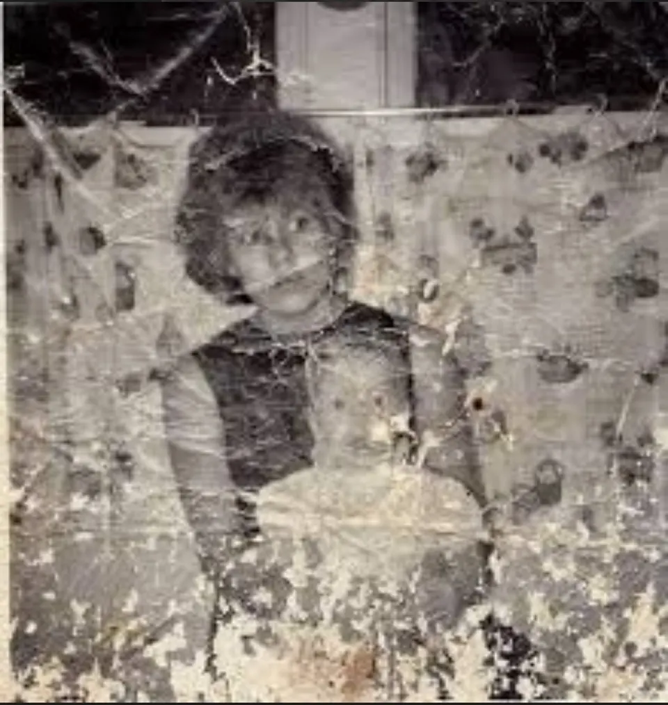 Reference image: Damaged Vintage Mother and Child Photo